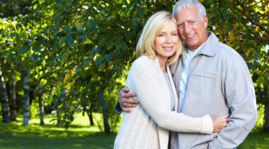 Happy senior couple relaxing in park. Golden age.