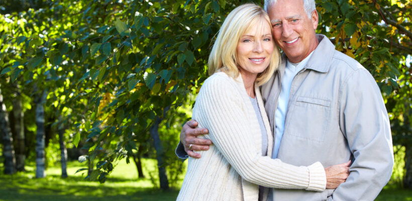 Happy senior couple relaxing in park. Golden age.